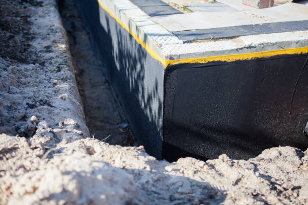 Professional Waterproofing technician working in Farmersville, OH